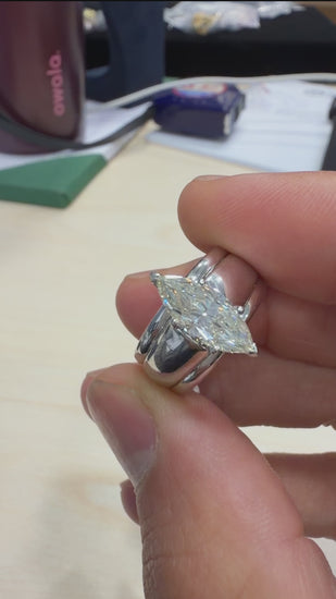 GIA Certified 1.46 Carat Marquise Diamond M/VVS2 Platinum Wide Band Ring